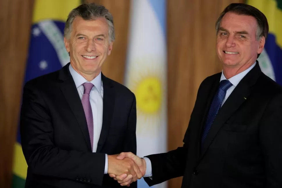 SINTONÍA. Macri y Bolsonaro no disimularon su satisfacción por los buenos resultados de la primera reunión bilateral. REUTERS 