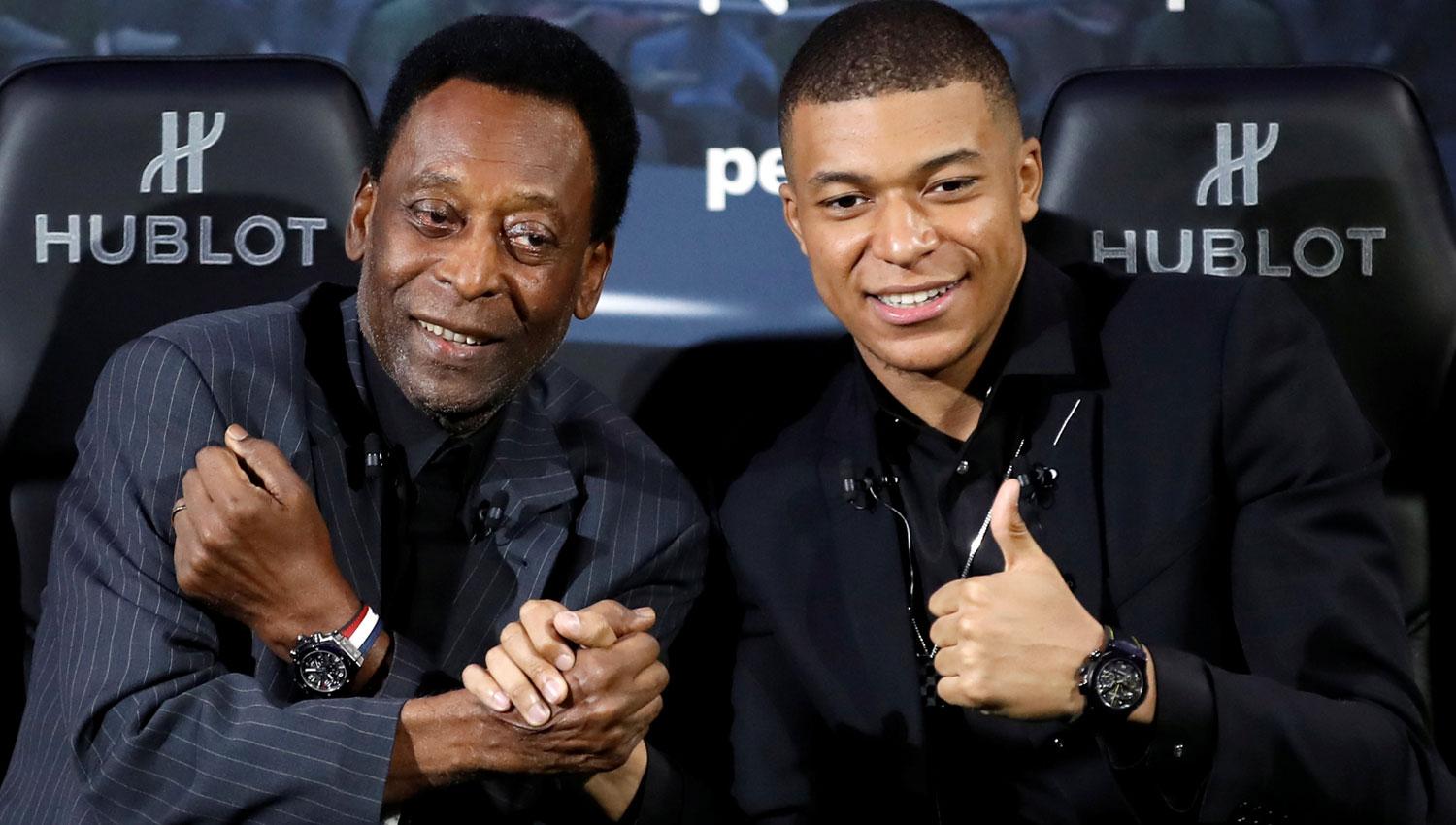 Pelé junto a Kylian Mbappé. REUTERS 