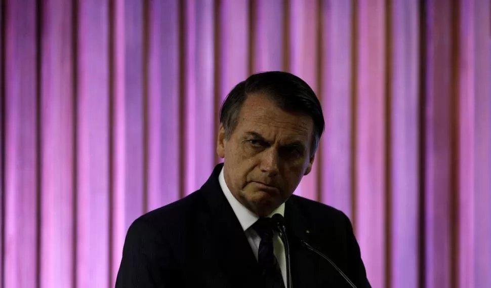 PELIGRO. Bolsonaro impulsó la flexibilización de la tenencia de armas.  Reuters