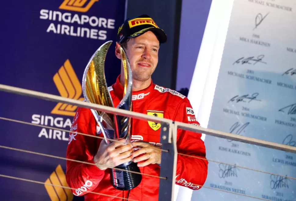 EMOCIONADO. Sebastian Vettel, tras un primer lugar. Ahora dejará Ferrari. reuters