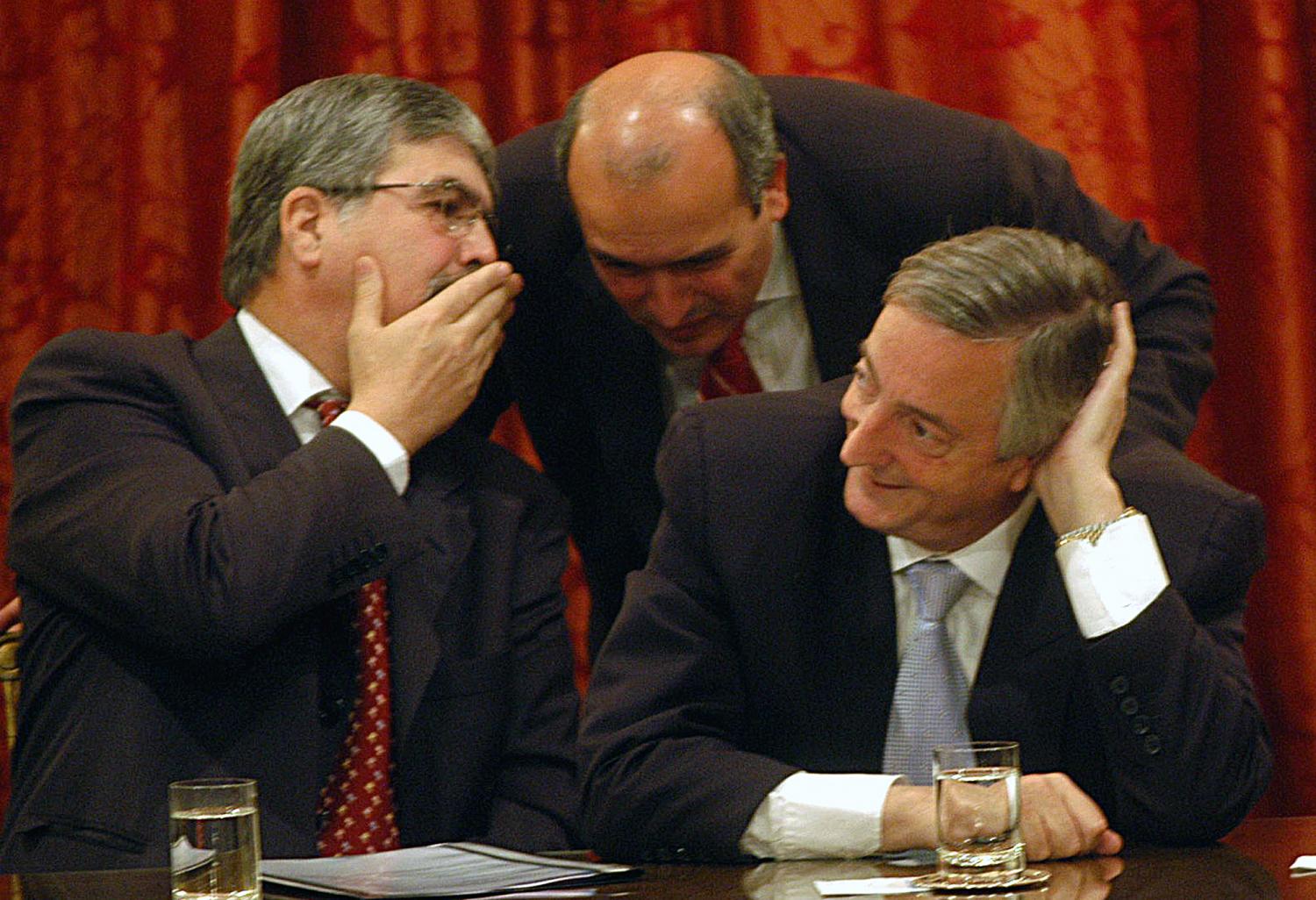 De Vido y López, junto al fallecido ex presidente Néstor Kirchner. ARCHIVO 