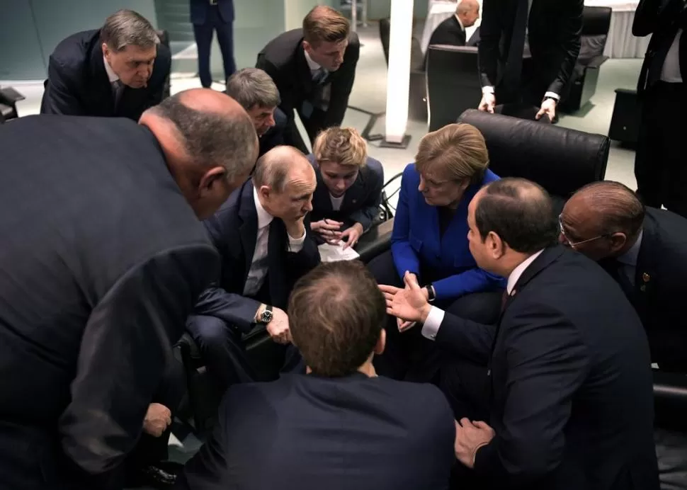 POTENCIAS. Emmanuel Macron, Angela Merkel, Antonio Guterres y Vladimir Putin estuvieron en la cumbre. reuters