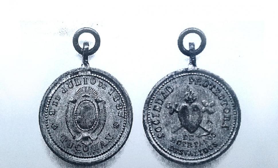 HISTORIA ACUÑADA. Medalla entregada por la Sociedad Protectora de Huérfanos y Desvalidos, el 9 de Julio de 1887. 