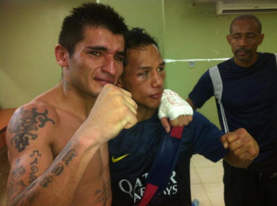 DESFIGURADOS. Ruiz (izquierda) y su rival, se dieron con todo en sus rostros.