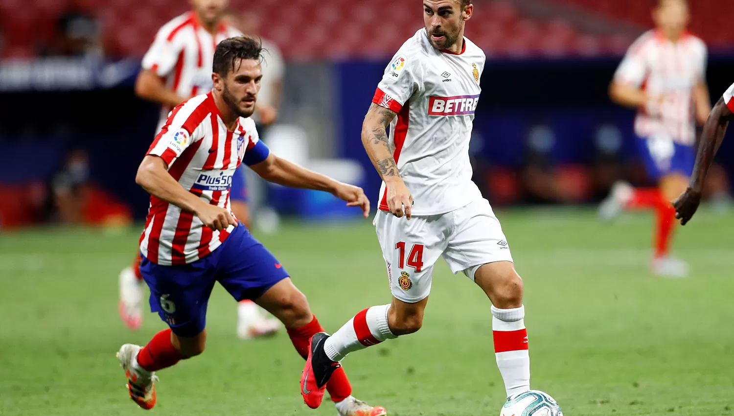 Koke, del Atlético de Madrid, en la marca de Dani Rodríguez. (Reuters)