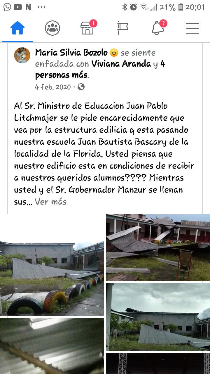 ESCUELA  “JUAN BAUTISTA BASCARY”, de La Florida. Muestra las chapas en el suelo después de una tormenta. Un edificio en malas  condiciones.