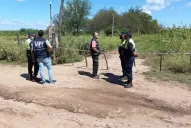Había un misterioso mensaje en la pared de la casa donde hallaron ahorcados a padre e hijo