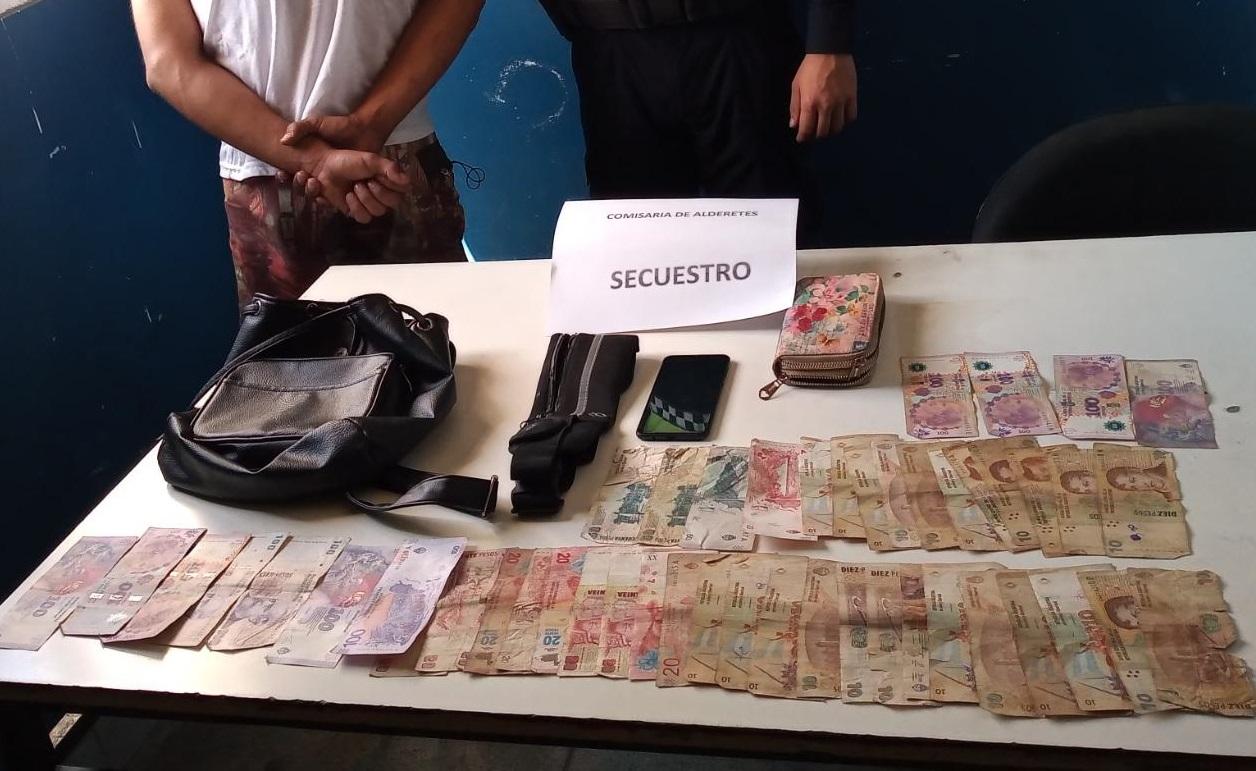 SECUESTRO. El dinero y los otros bienes sustraídos a la víctima por el sospechoso. Foto: Ministerio de Seguridad
