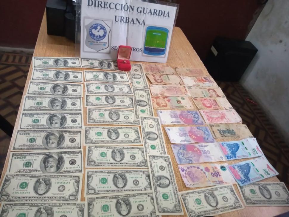PRUEBAS. Los dólares, el anillo de oro y los pesos que se le secuestraron a imputado cuando fue detenido.