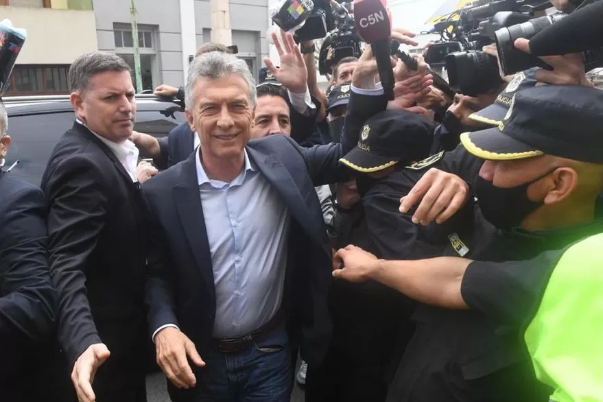 Captura del gesto agresivo de Macri. Telam