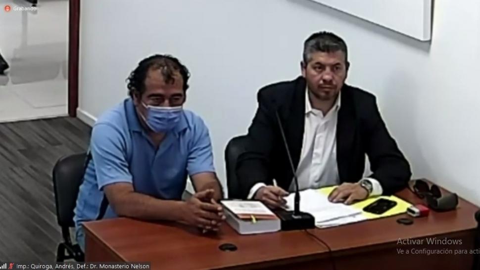 EL IMPUTADO. Andrés Quiroga junto a su defensor, Nelson Monasterio. IMAGEN CAPTURA DE VIDEO