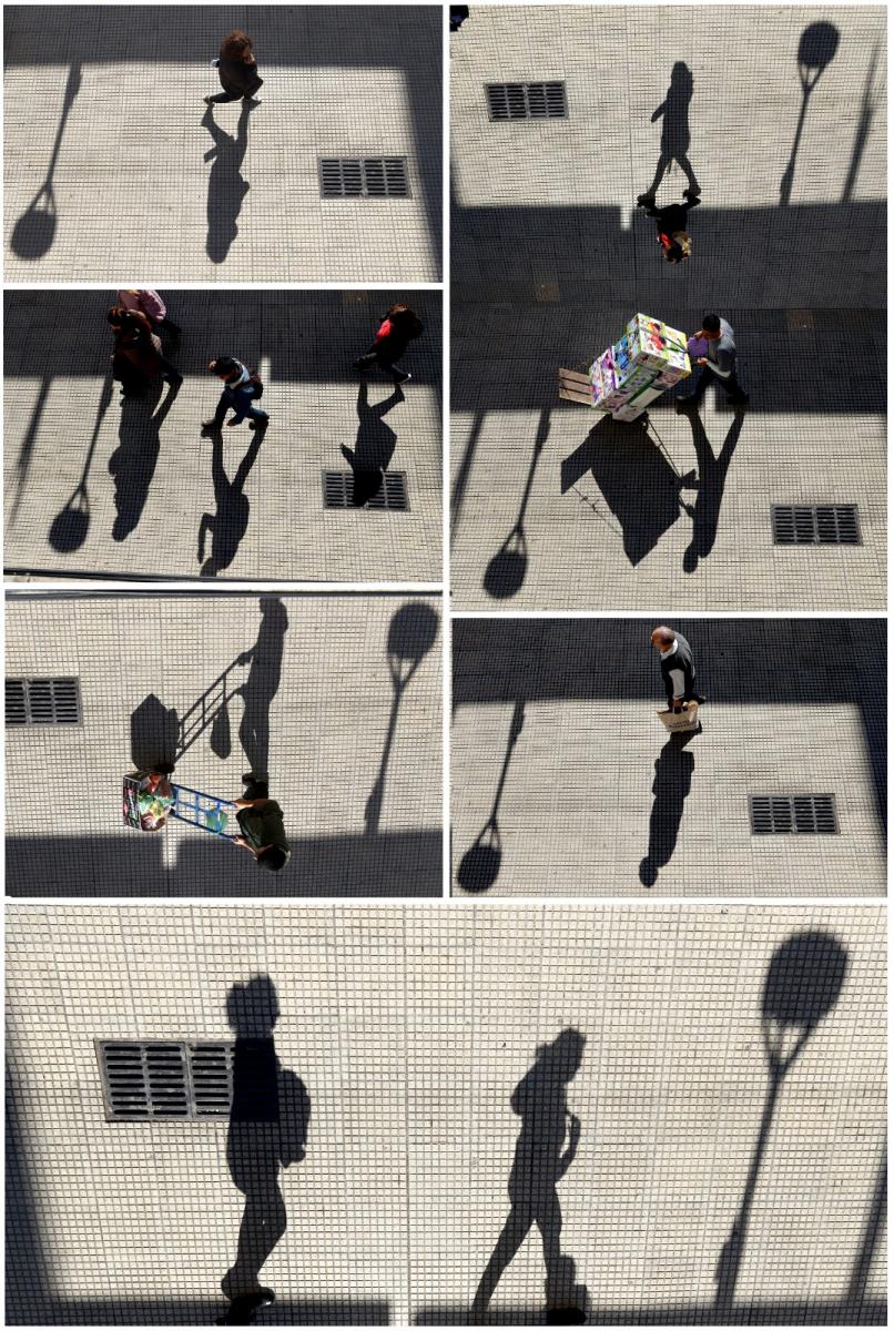 La foto del día: transeúntes se alejan con su sombra al paso