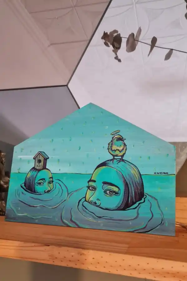 CUORE EN ACCIÓN. Ignacio Stesina suele pintar grandes murales que requieren trabajo en altura.