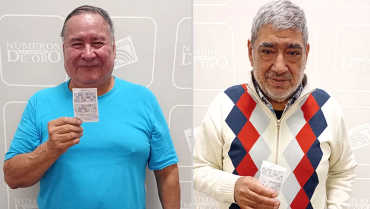 LOS GANADORES. Ángel Miguel Arias y Eduardo García muestran la tarjeta que les valió el premio.