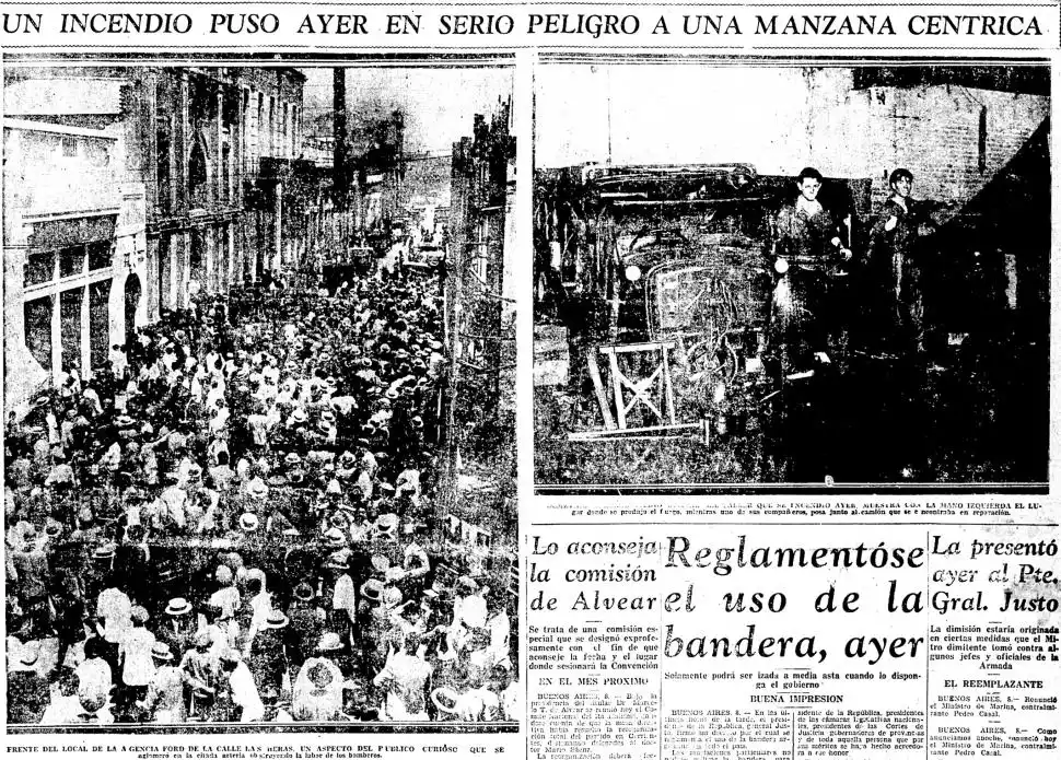 INCENDIO Y CURIOSOS. El público se acerca a la zona donde las llamas quemaron una concesionaria en San Martín al 800, en 1933.