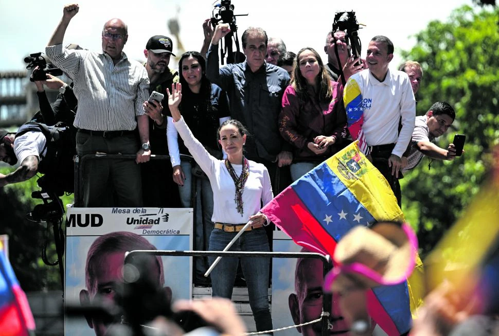 VOCES CONTRARIAS. La oposición venezolana afirma que se impuso en los comicios, por amplio margen. 