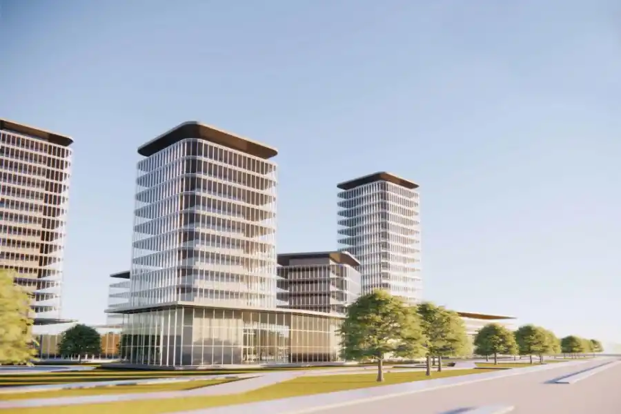 INICIATIVA DE LA CIUDAD. Torres habitacionales con un zócalo comercial.