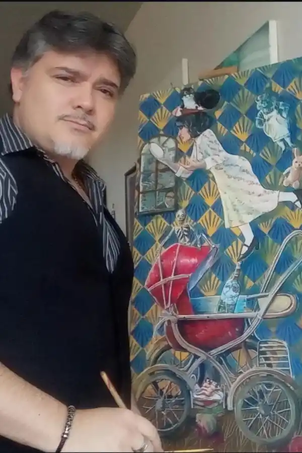 EN ACCIÓN. Frido Nuñez con una de las pinturas que expondrá.