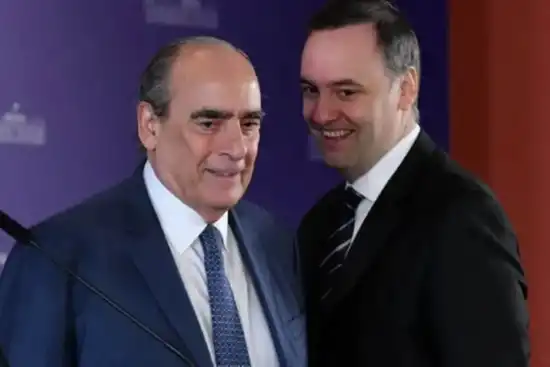 Guillermo Francos y Manuel Adorni.