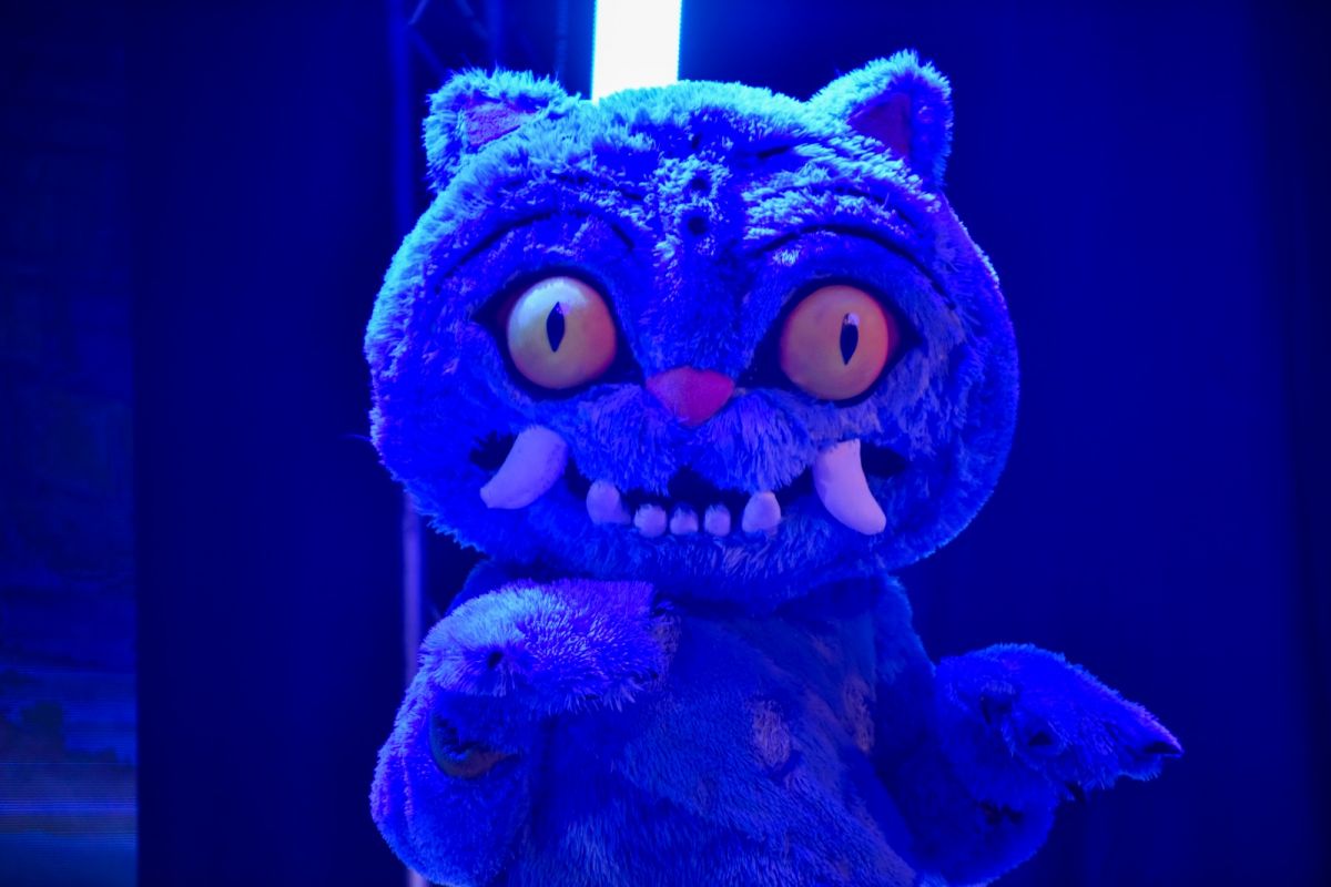 DERPY TIGER. Este personaje es un tigre gigante y azul que representa una guía espiritual y protectora.
