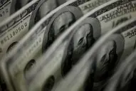 El riesgo país cayó por debajo de los 500 puntos y el BCRA volvió a comprar dólares