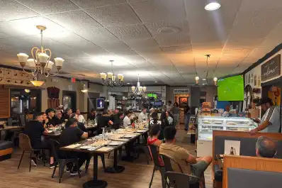 Seis campeones del mundo probaron empanadas tucumanas y sánguches de milanesa en Kansas City