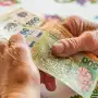 La razón por la que un jubilado puede recibir menos de $70.000 del bono de Anses