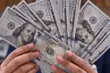 El dólar oficial subió a $1.520 en el Banco Nación y el blue bajó por quinta rueda seguida