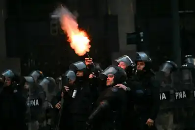 Represión en el Congreso: una fotógrafa terminó con traumatismo de cráneo durante la protesta contra la Ley de Propiedad Privada