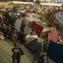 Trasladan a 1.700 migrantes a carpas del puerto de Ceuta